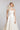 Bustier Hochzeitskleid LIME aus luxuriösem Seiden Mikado mit weit schwingendem Rock und eleganter Schleppe, Frontansicht im Studio.