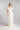 Schlichtes Brautkleid IRIS mit Bustier‑Top, zarter Schleppe und abnehmbarem Plisseekragen aus Seidenorganza.