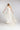 ASH One‑Shoulder Brautkleid mit WIND Organzaoverskirt, weiter transparenter Rock mit Schlitz und Schleppe in Bewegung.