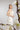 Modernes Hochzeitskleid VIOLA mit applizierten Plissees am Bustier und eleganter, bodenlanger Seidencrepe‑Silhouette.
