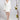 Kurzes Braut Blazer‑Kleid CARRY mit eleganter, moderner Silhouette und V‑Ausschnitt, Frontansicht im Studio.
