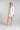 Kurzes Braut Blazer‑Kleid CARRY mit eleganter, moderner Silhouette und V‑Ausschnitt, Frontansicht im Studio.